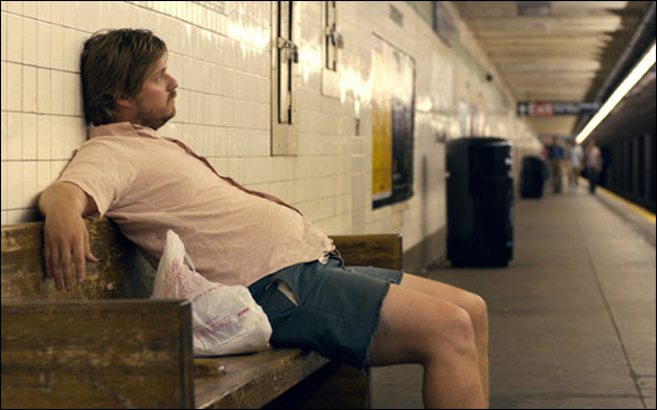Tim Heidecker sits in a subway station in a scene from Rick Alverson's "The Comedy"