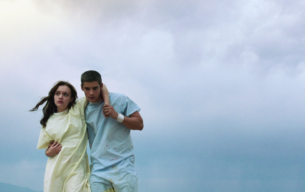 Olivia Cooke and Brenton Thwaites in "The Signal"
