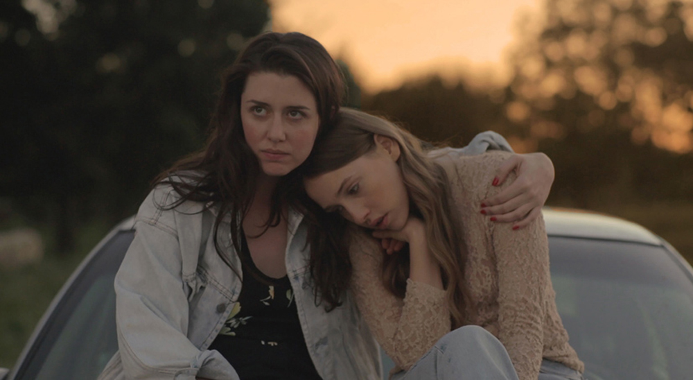 Zoe Worth and Sarah Sutherland in "Shut Up and Drive"