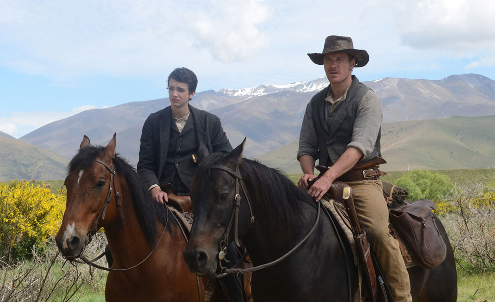 Michael Fassbender and Kodi Smit-McPhee in "Slow West"