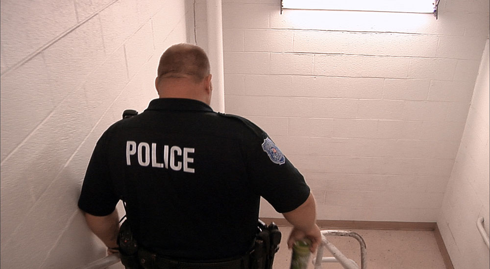 A policeman in Warren, Michigan in a scene from "Tom Swift and His Electric Rifle"