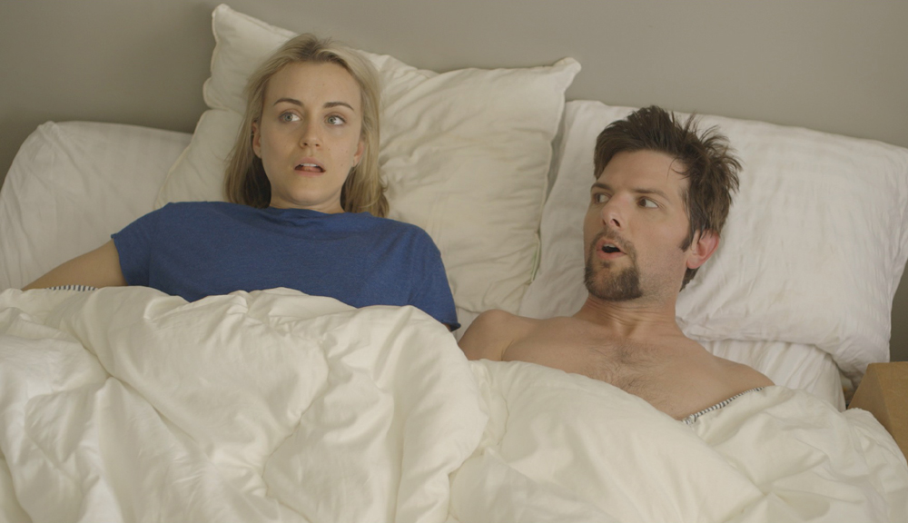 Taylor Schilling and Adam Scott in "The Overnight"