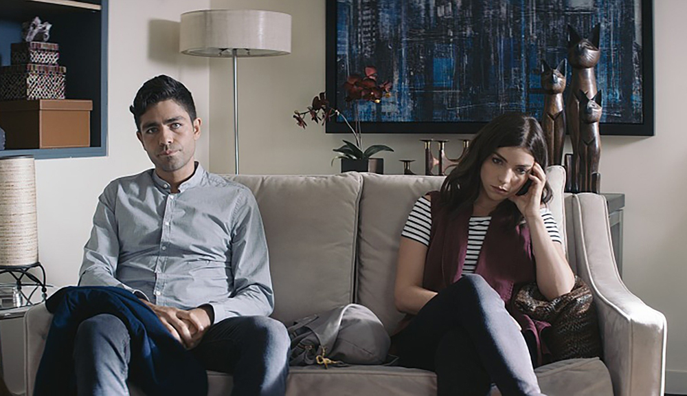 Adrian Grenier and Angela Trimbur in "Trash Fire"