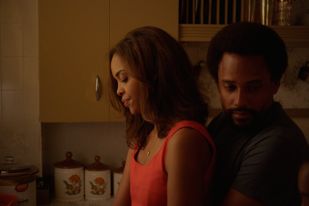 Sharon Leal and Hill Harper in "1982"