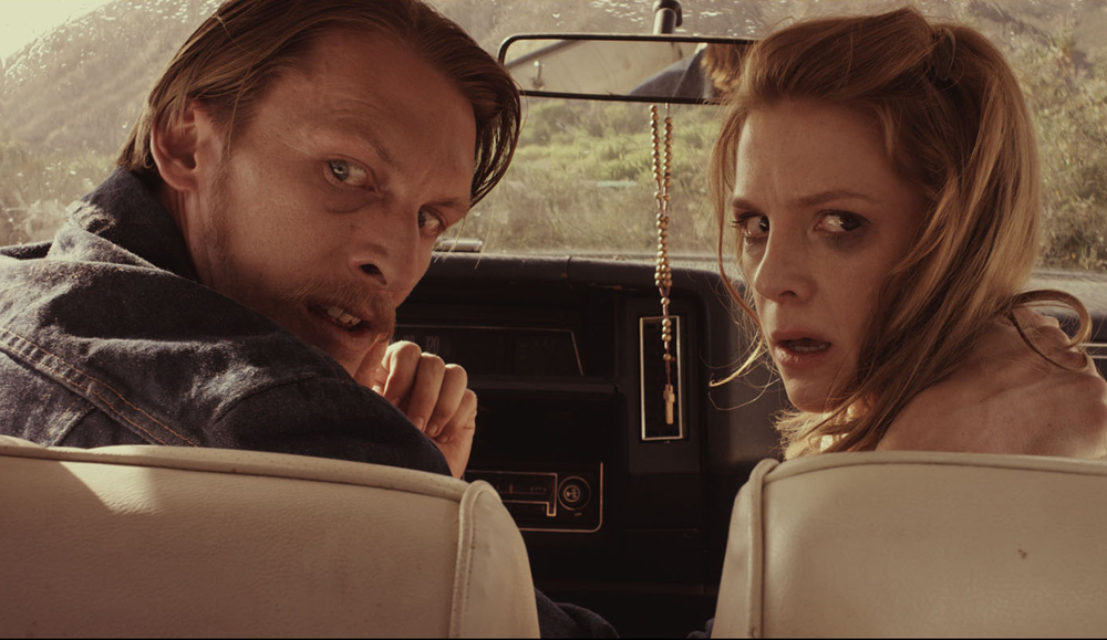 James Landry Hebert and Ashley Bell in "Carnage Park"