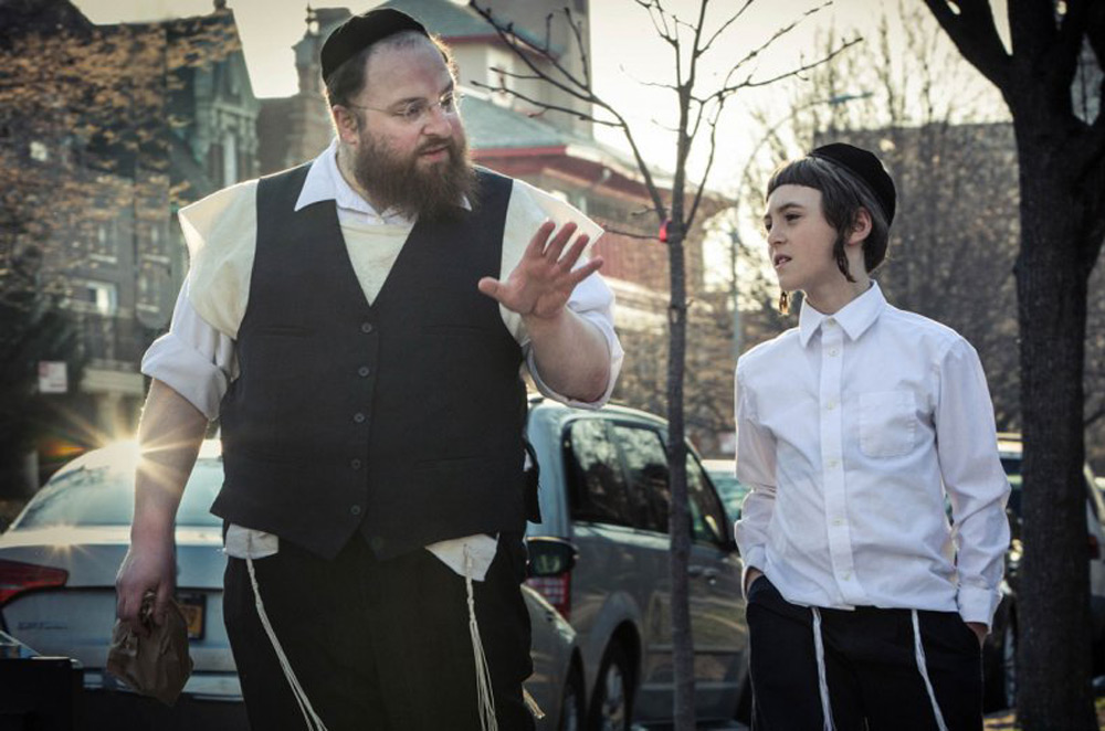 Ruben Niborski and Menashe Lustig in "Menashe"