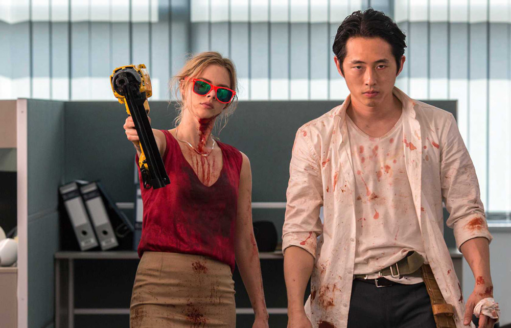 Samara Weaving and Steven Yeun in "Mayhem"