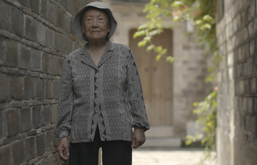 Madame Xia in "The Girl in the Picture"