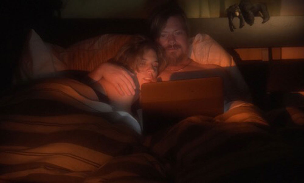 Linas Phillips and Maëlle Poesy-Guichard in "The Great Pretender"