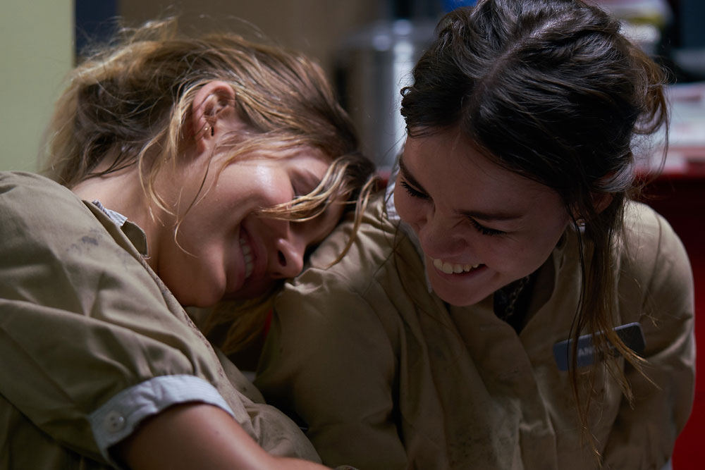 Maia Mitchell and Cami Morrone in "Never Goin' Back"