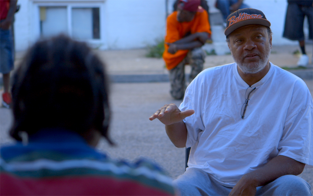 Clayton “Mr. C.” Guyton in "Charm City"