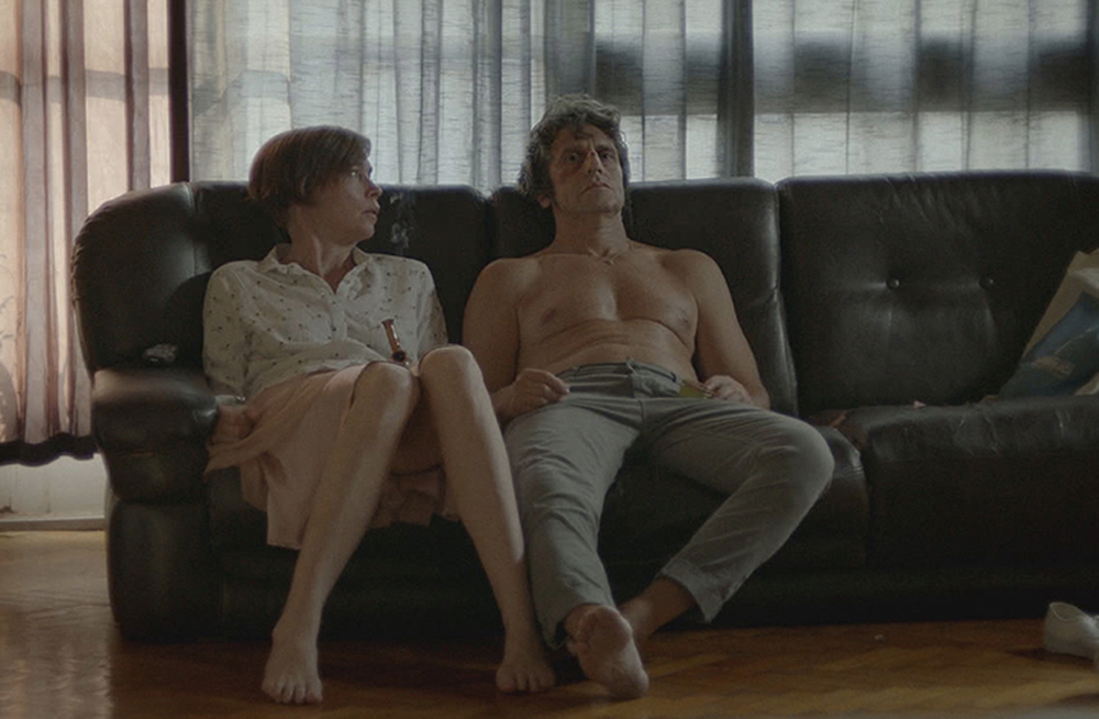 Diego Peretti and Julianne Nicholson in "Initials S.G."